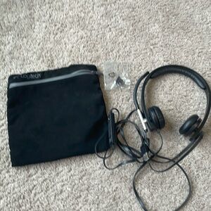 Black headset with mic and bag